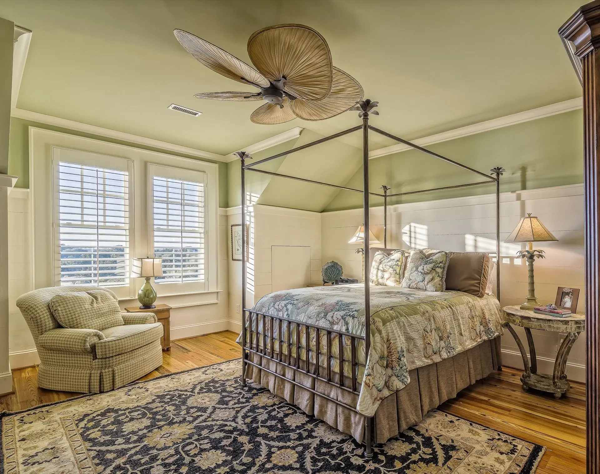 Calm residential suite with architectural wooden shutters and soft filtered sunshine