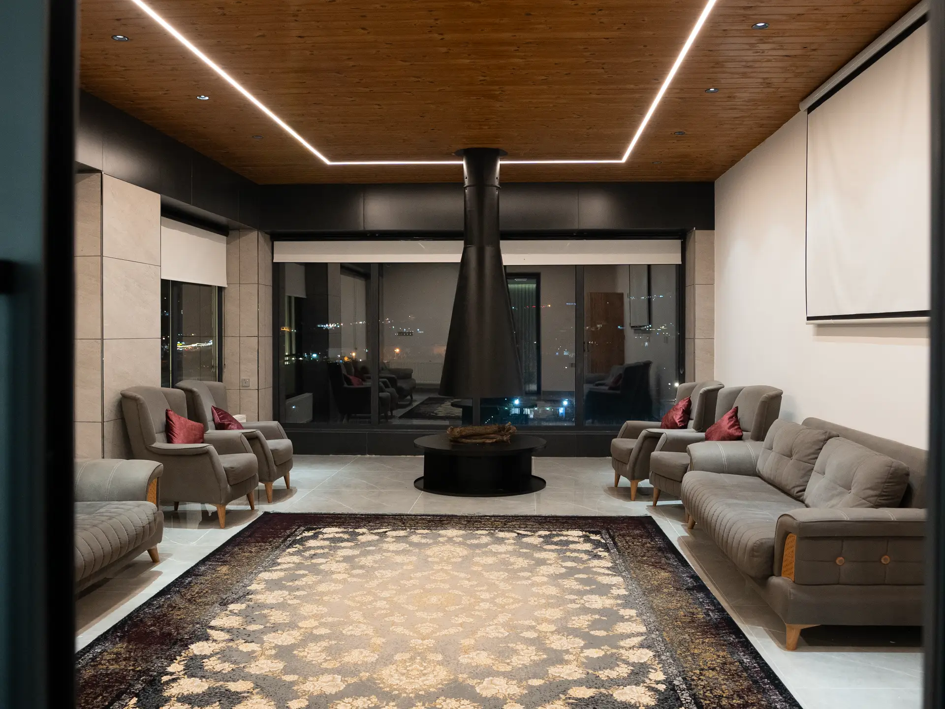 Contemporary living sanctuary with suspended hearth and alpine timber finishes
