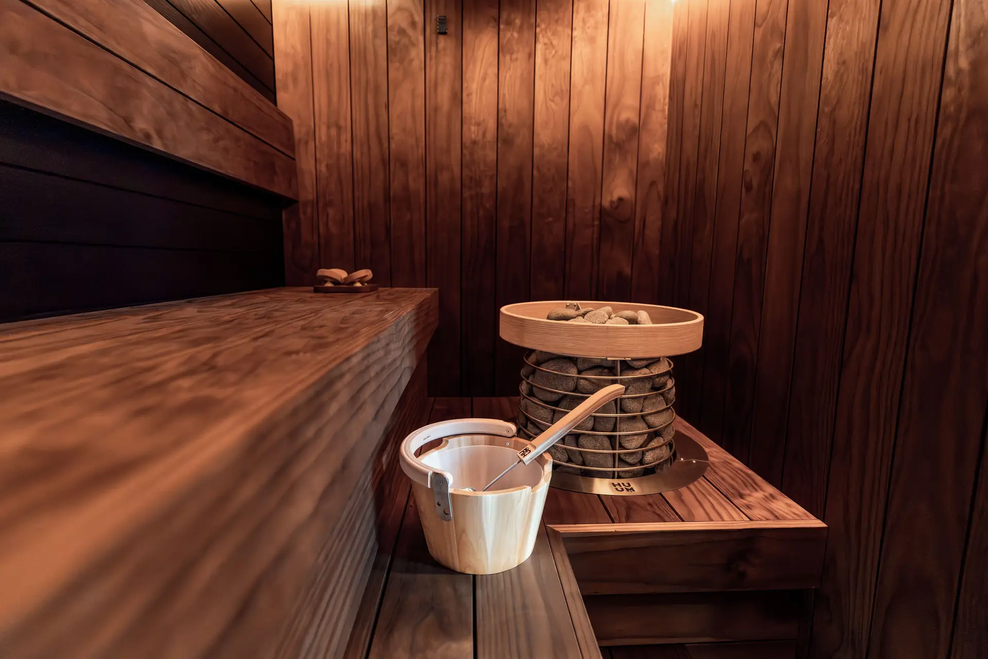 Atmospheric warm timber architectural interior with gentle ambient illumination